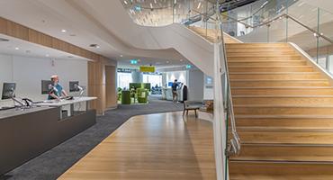 Stairs and front desk to Library