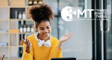 A woman with a yellow sweater smiles at their laptop. A white #MT logo with a clock sits on the upper right hand corner